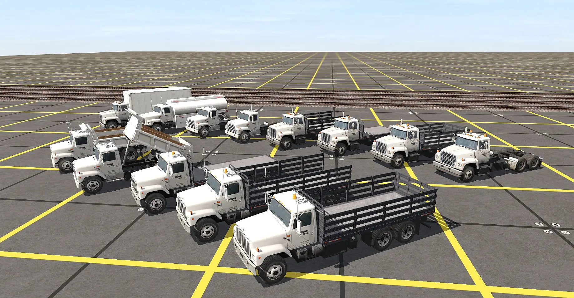 A Set of Trucks Placed on the Ground Image